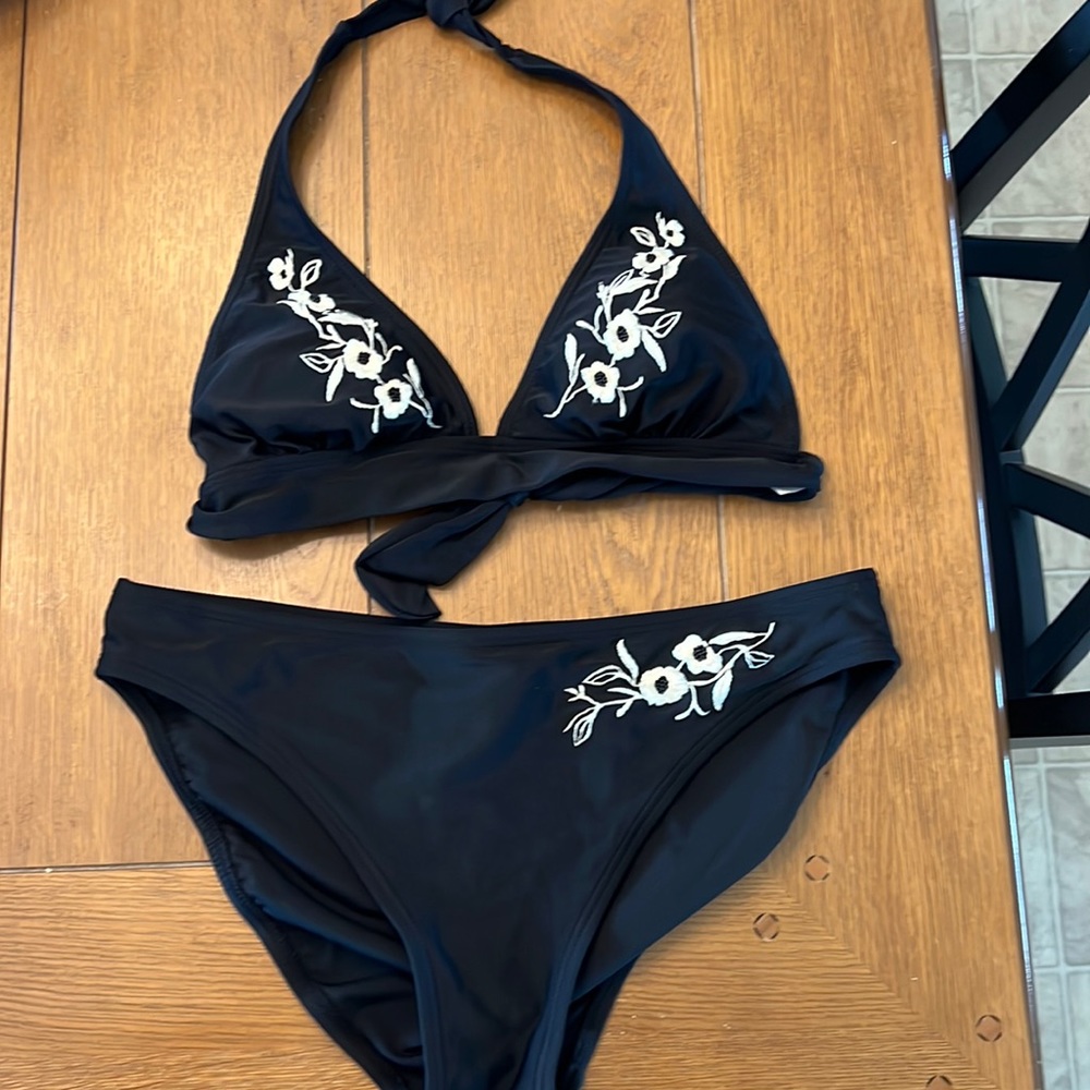 Black bikini with white floral design